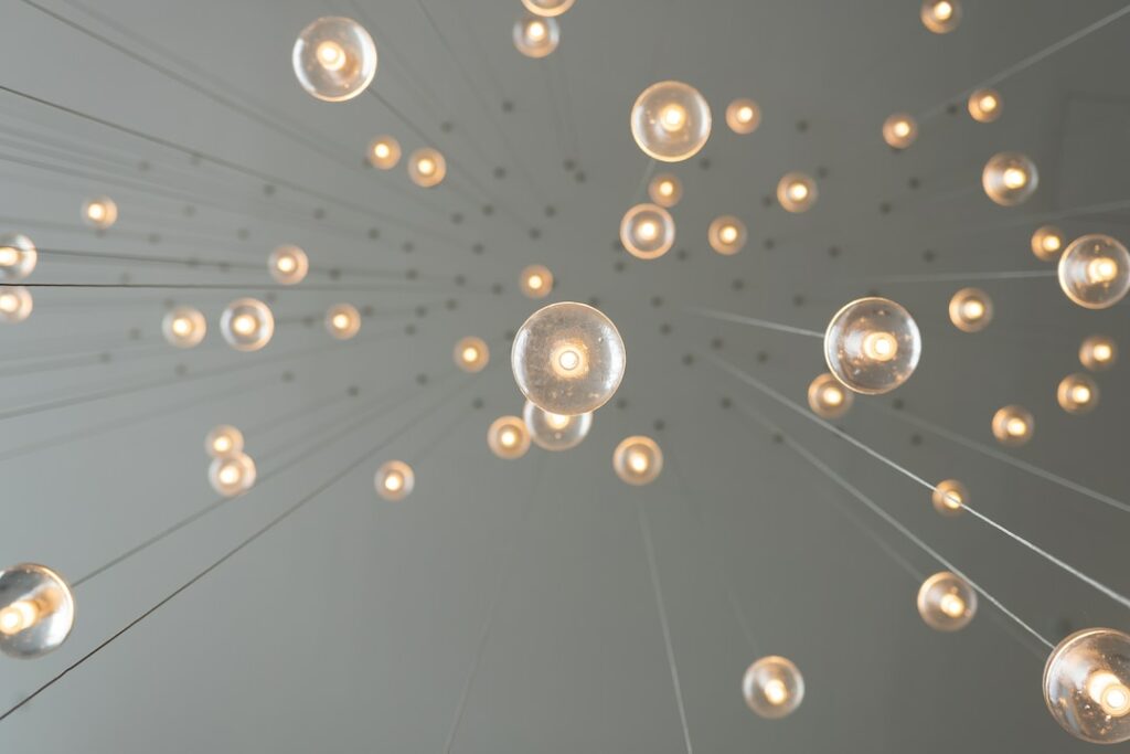 Light bulbs hanging, representing the power of collaboration