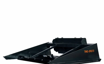 A road grader blade set on an angle rebuilds the crown a gravel drive loses every year